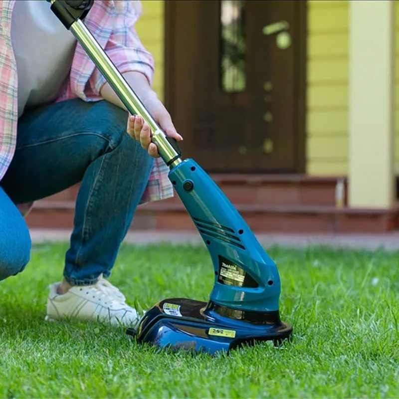 Триммер садовый электрический Makita 450Вт (UR3000) фото 12