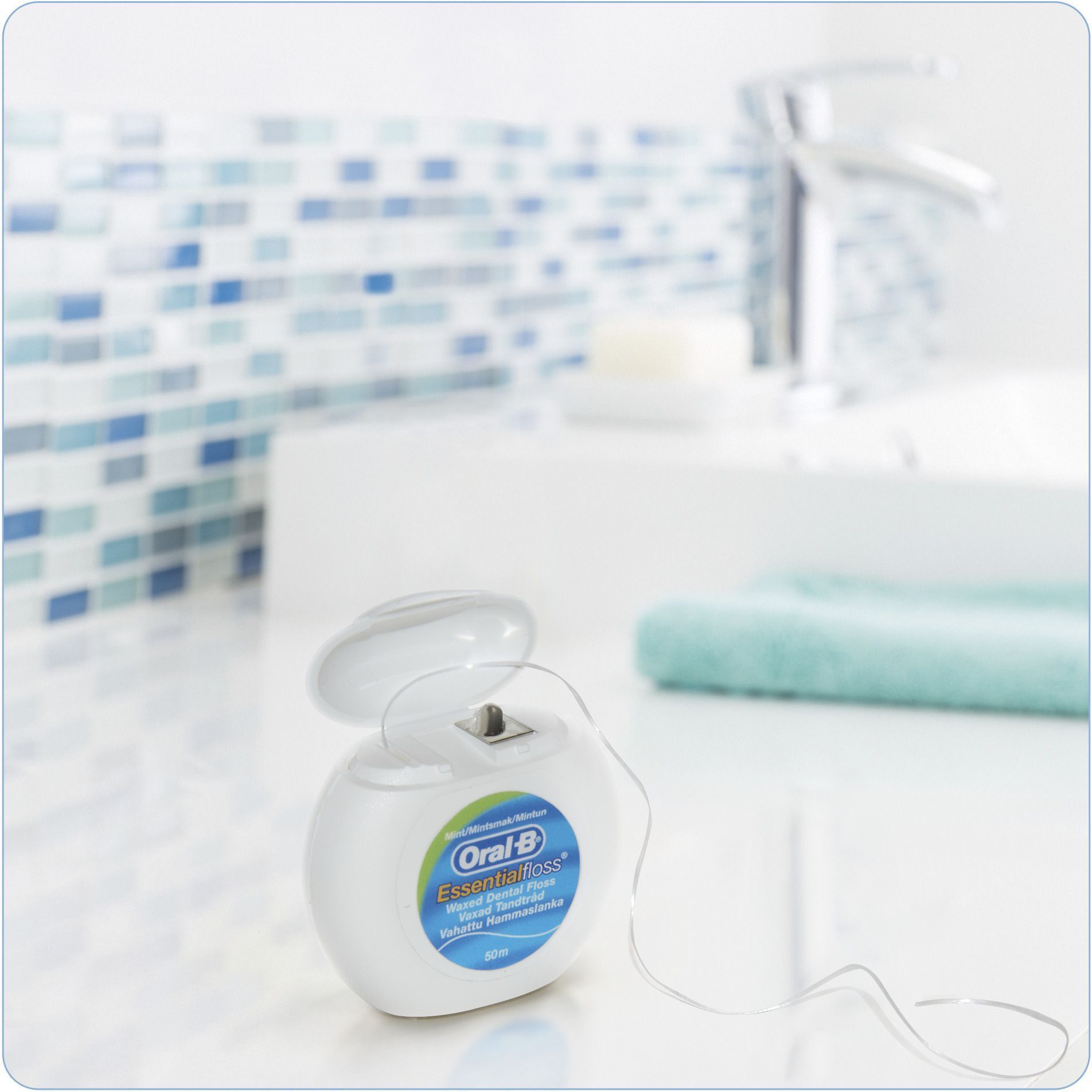 Зубна нитка Oral-B Essential М'ятна 50мфото