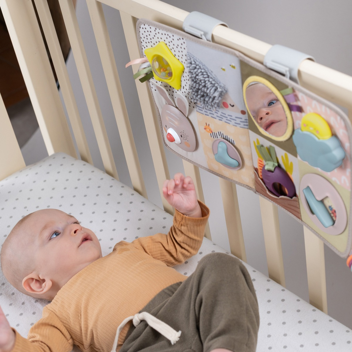 Розвиваючий центр для ліжечка колекції "Садок у Місті" - Пізнай Світфото