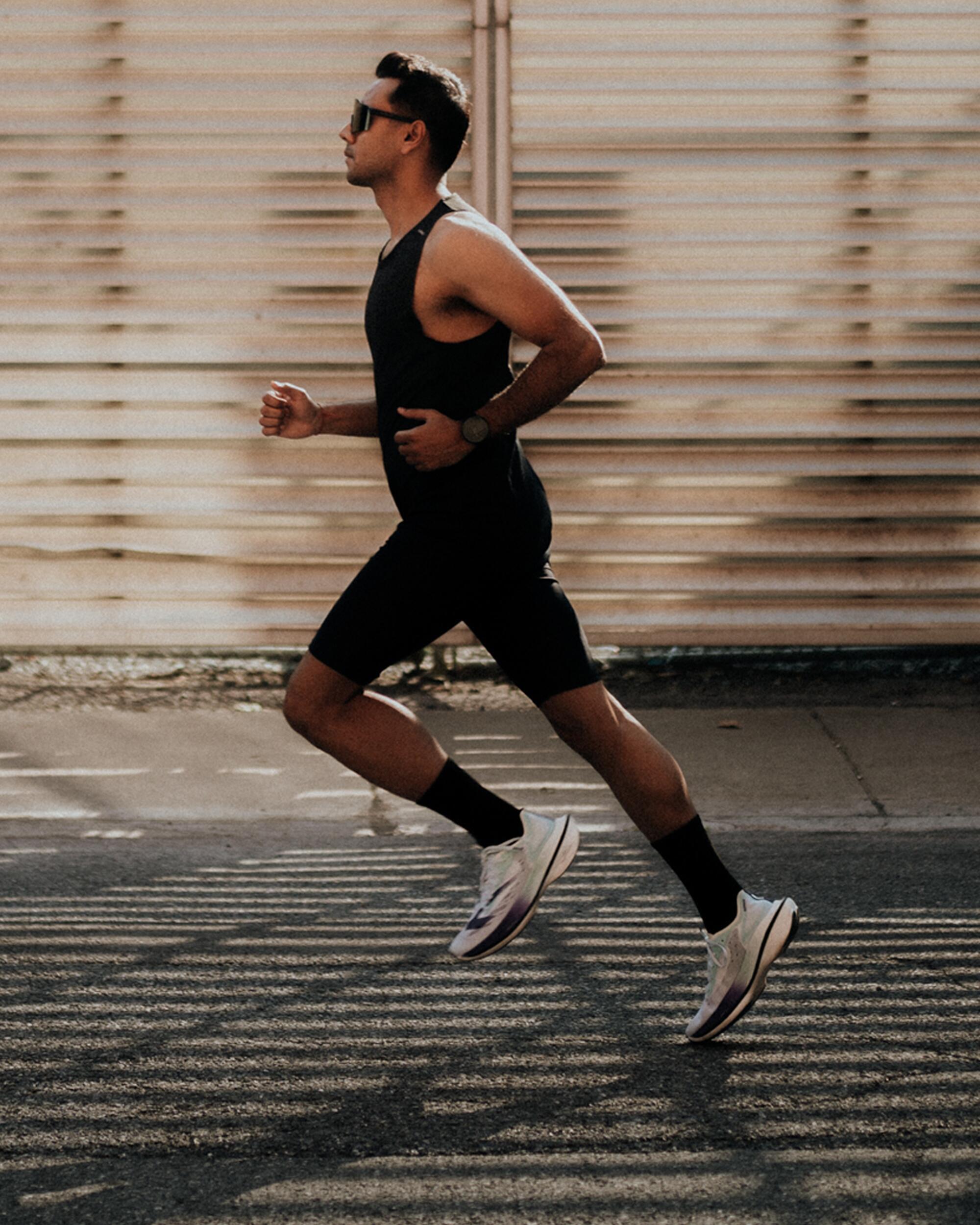 Шорты-тайтсы мужские для бега Kalenji DRY 100 8817446 3XL черные фото 