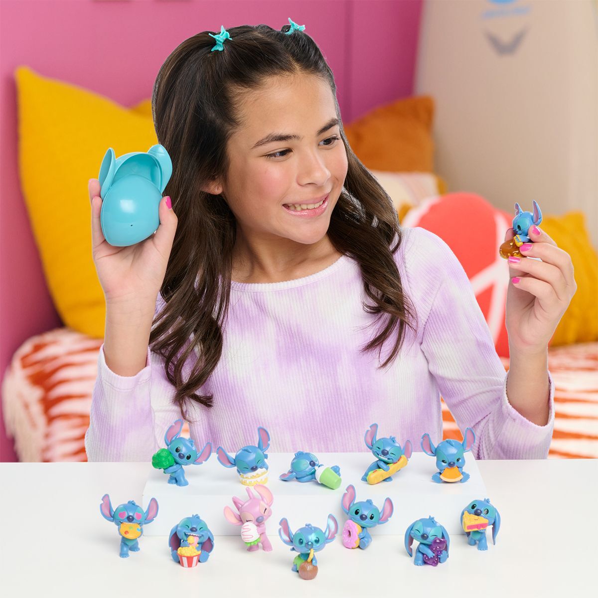 Фігурка-сюрприз у капсулі STITCH серії "Feed Me" - СТІЧ ЗІ СМАКОЛИКАМИ (в асорт.) (46288)фото