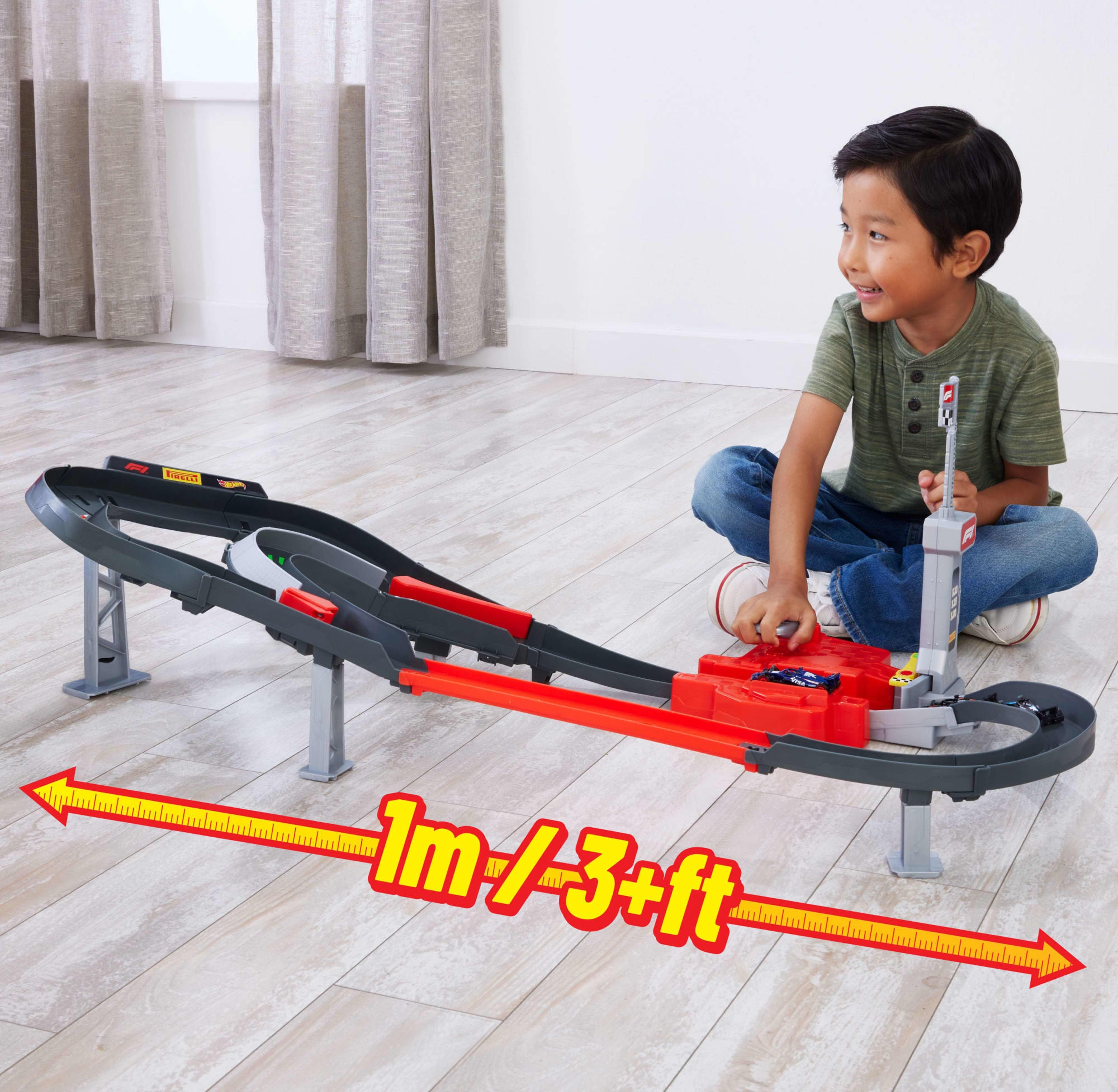 Набір "Траса для перегонів Формули 1" Hot Wheels (JDY15)фото