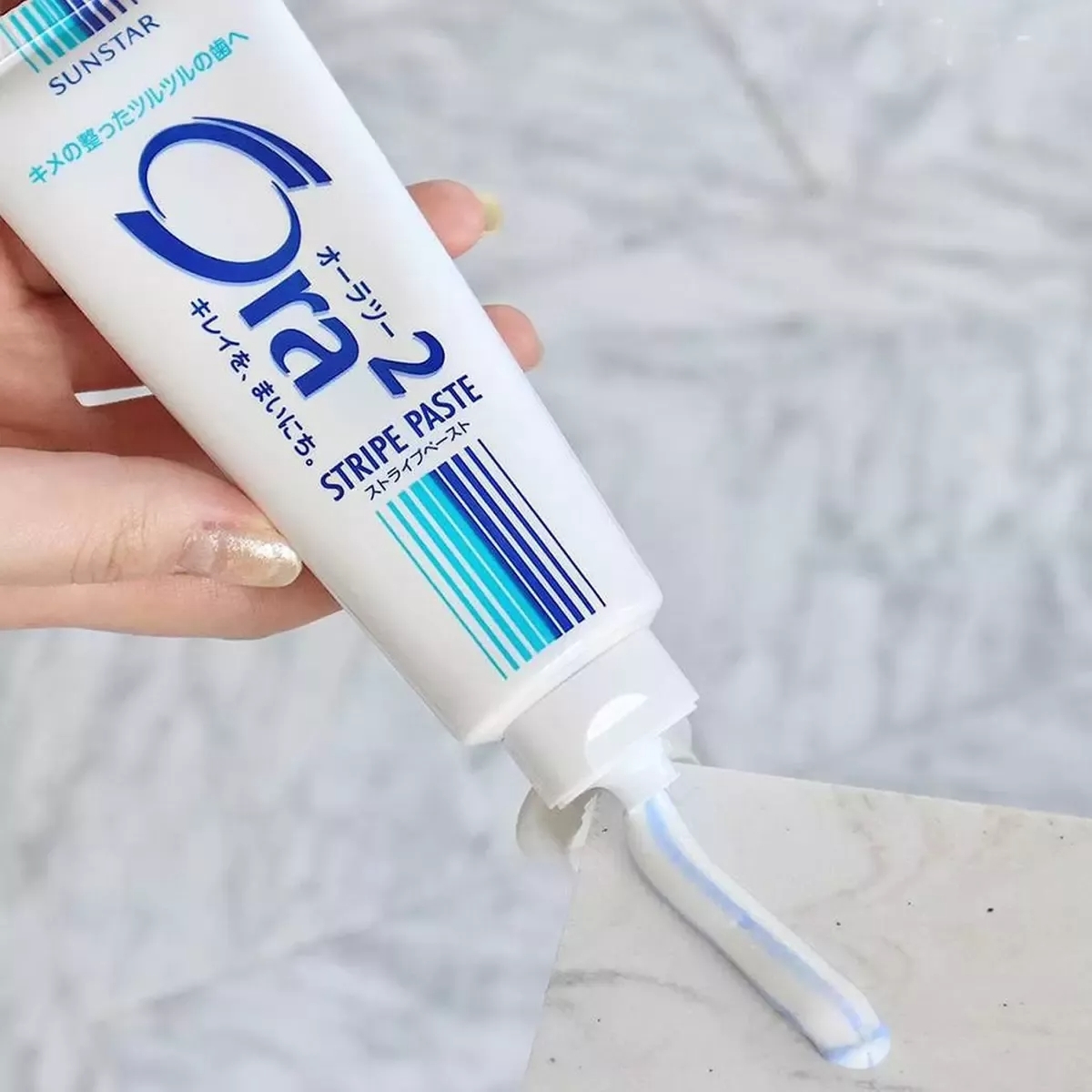 Зубна паста SunStar Ora2 Stripe Paste подвійний кальцій 140 гфото