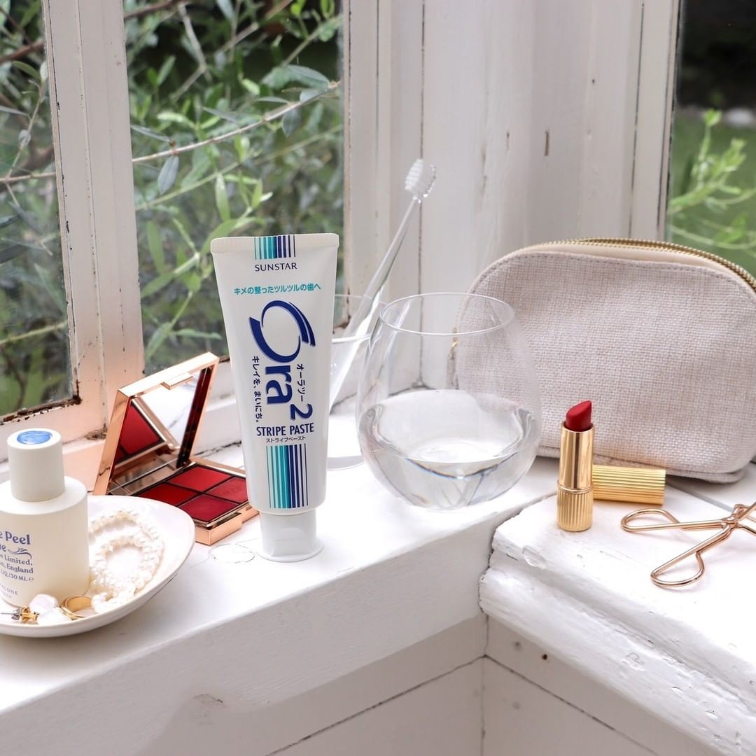 Зубна паста SunStar Ora2 Stripe Paste подвійний кальцій 140 гфото