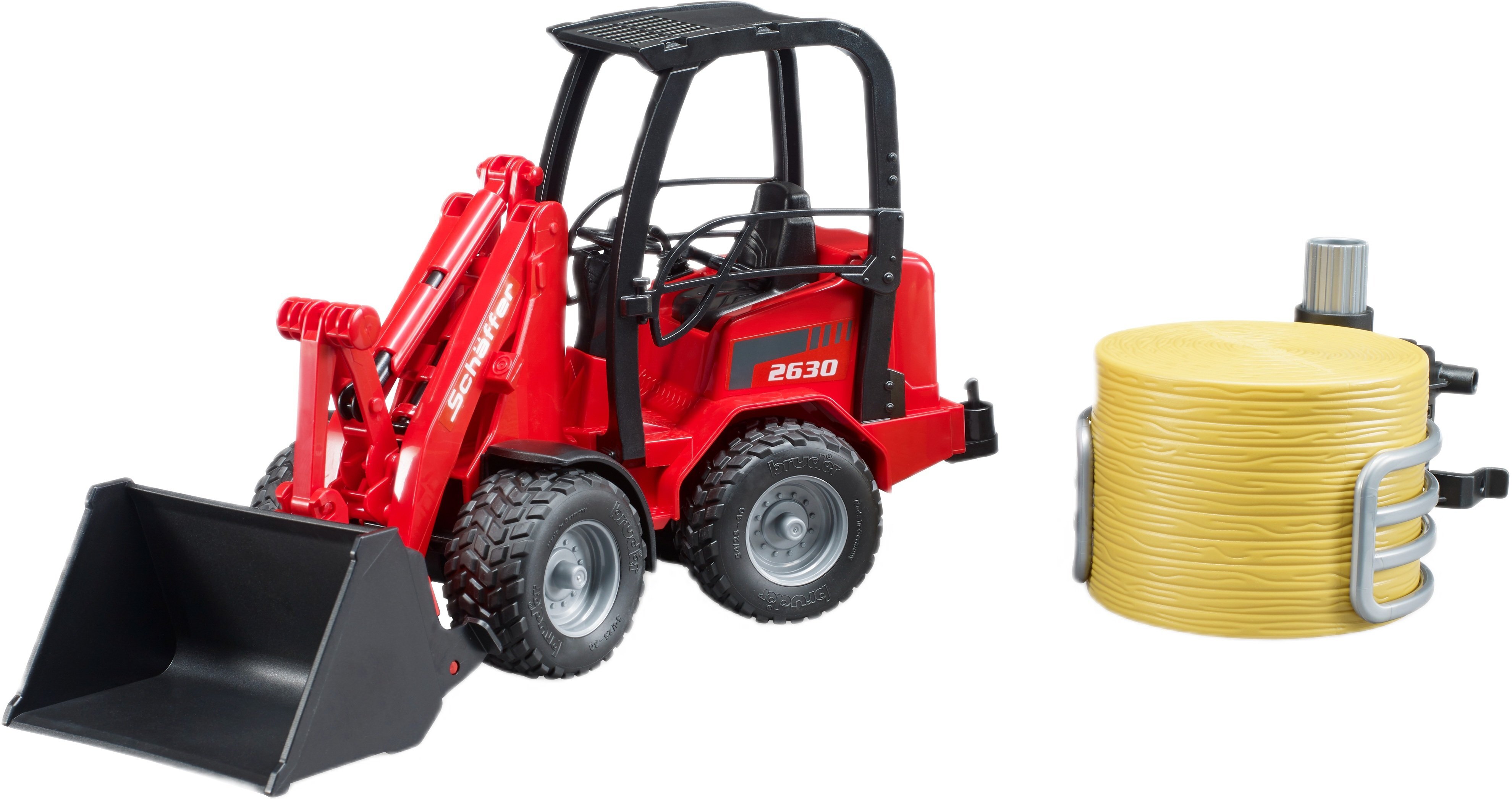 Минипогрузчик Bruder Schaffer Compact 2630 с аксессуарами (2192) фото 