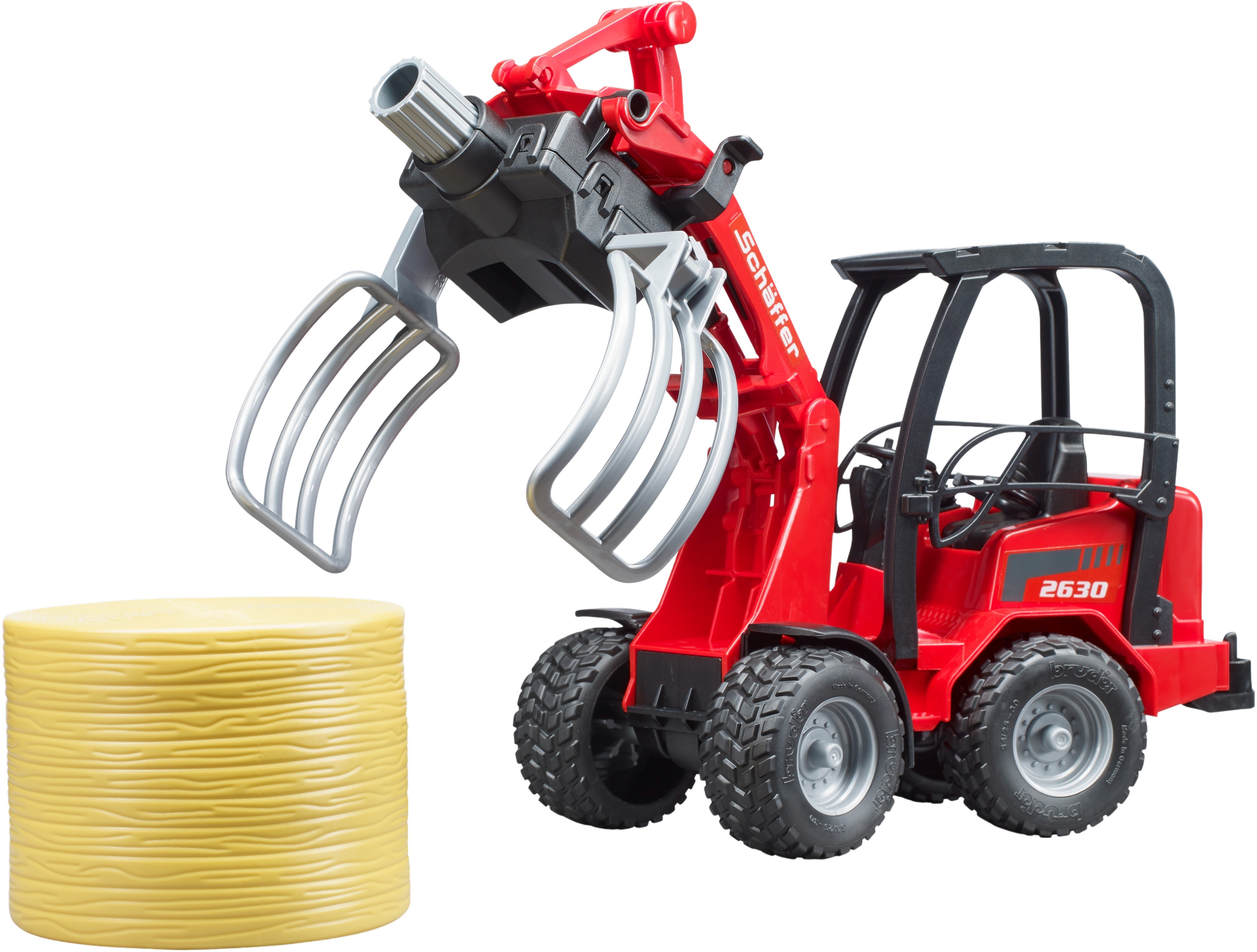 Минипогрузчик Bruder Schaffer Compact 2630 с аксессуарами (2192) фото 