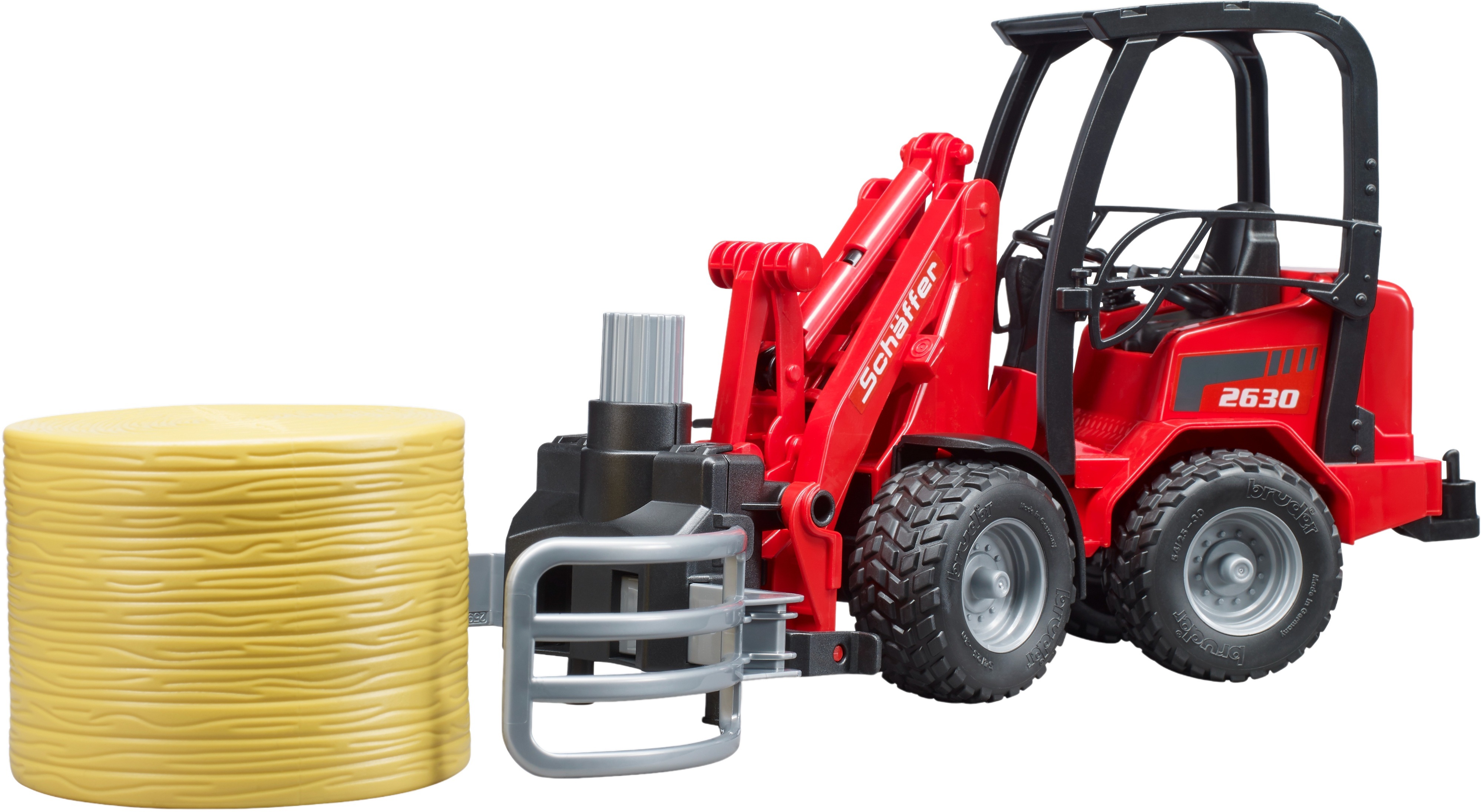 Минипогрузчик Bruder Schaffer Compact 2630 с аксессуарами (2192) фото 