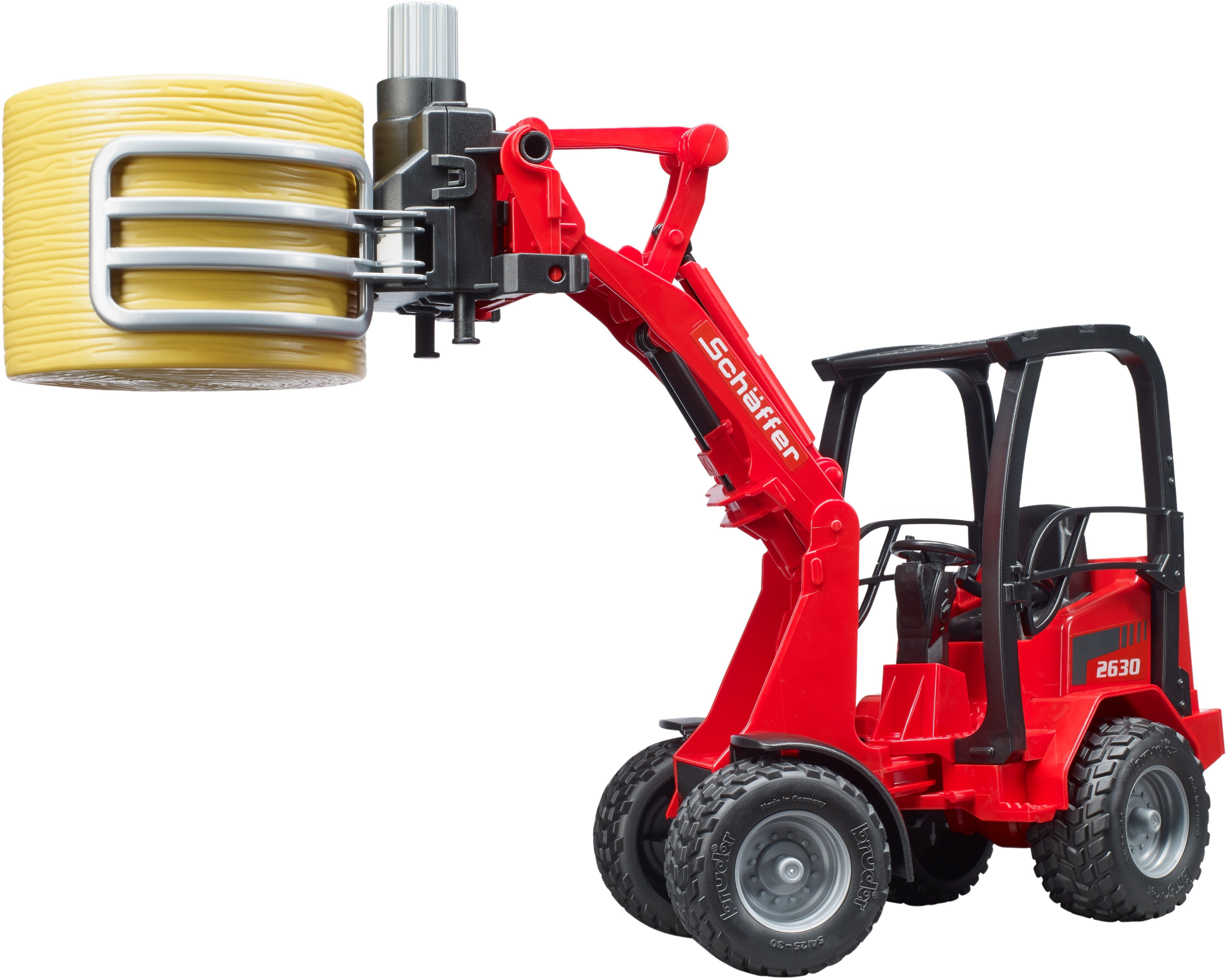 Минипогрузчик Bruder Schaffer Compact 2630 с аксессуарами (2192) фото 