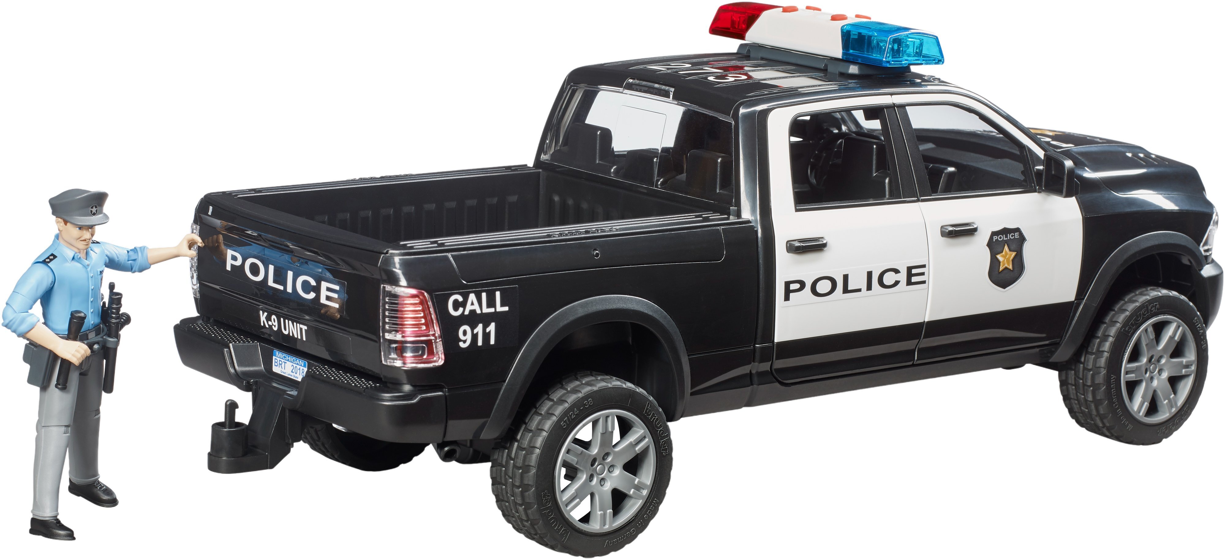 Полицейский автомобиль Bruder RAM 2500 с фигуркой полицейского (2505) фото 