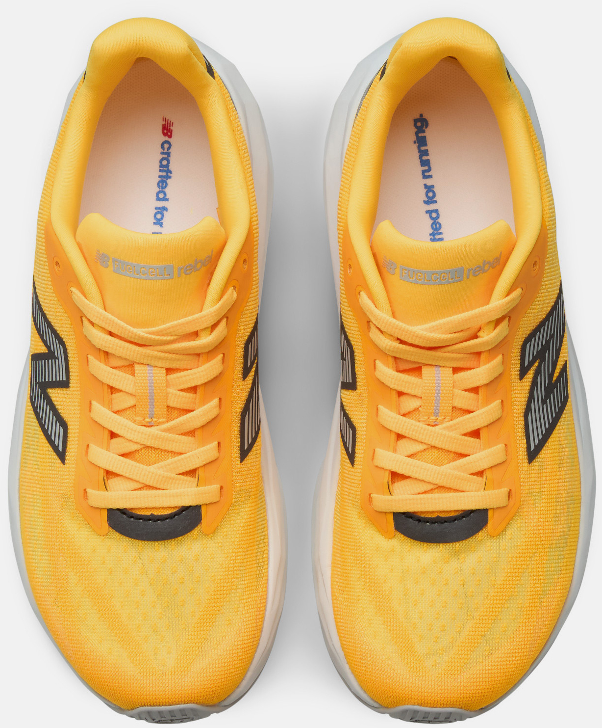 Кросівки жіночі New Balance FuelCell Rebel V5 WFCX2C3 39 (8 US) помаранчеві фото5