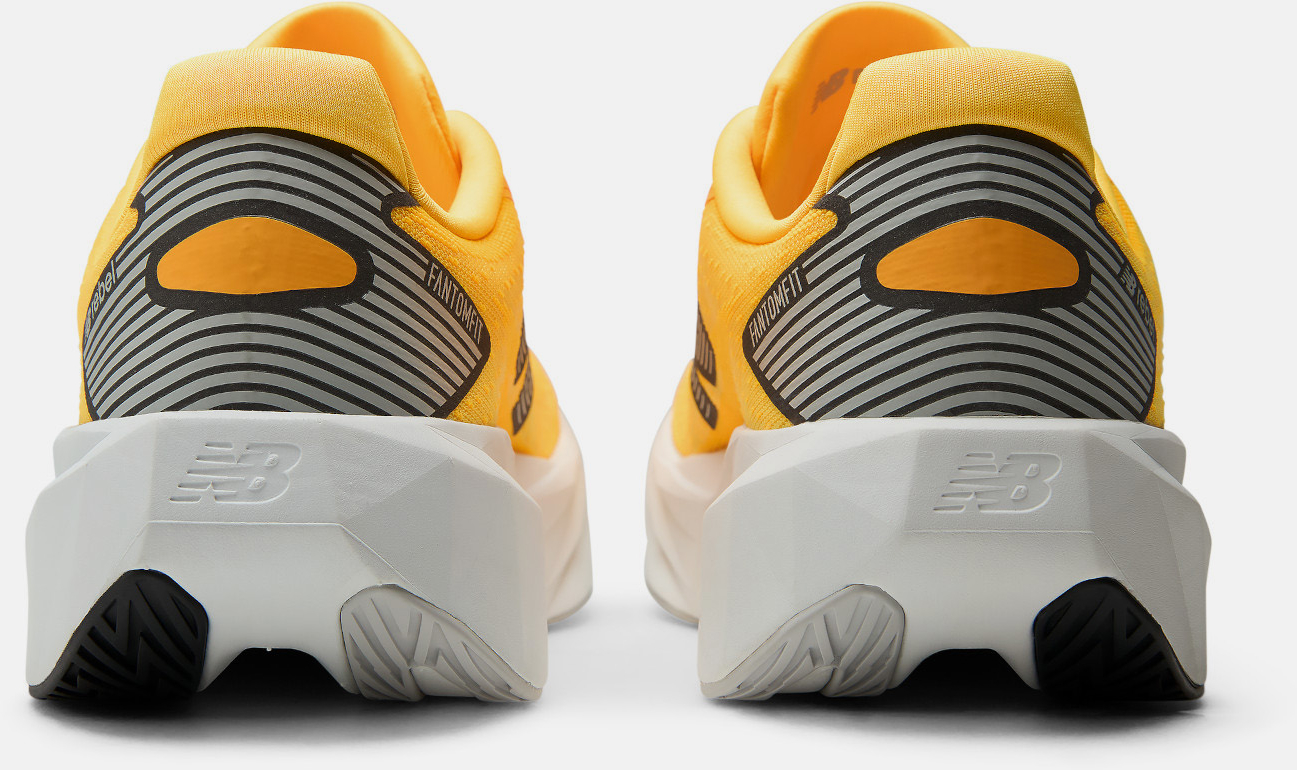 Кросівки жіночі New Balance FuelCell Rebel V5 WFCX2C3 39 (8 US) помаранчеві фото6