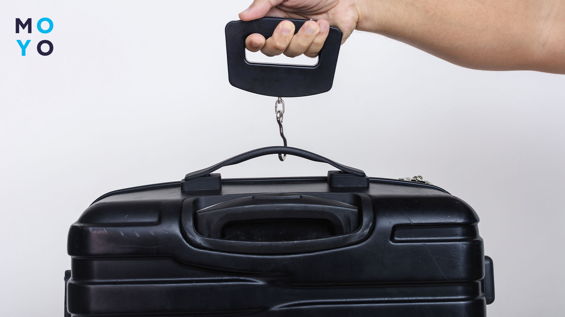 зважування валізи